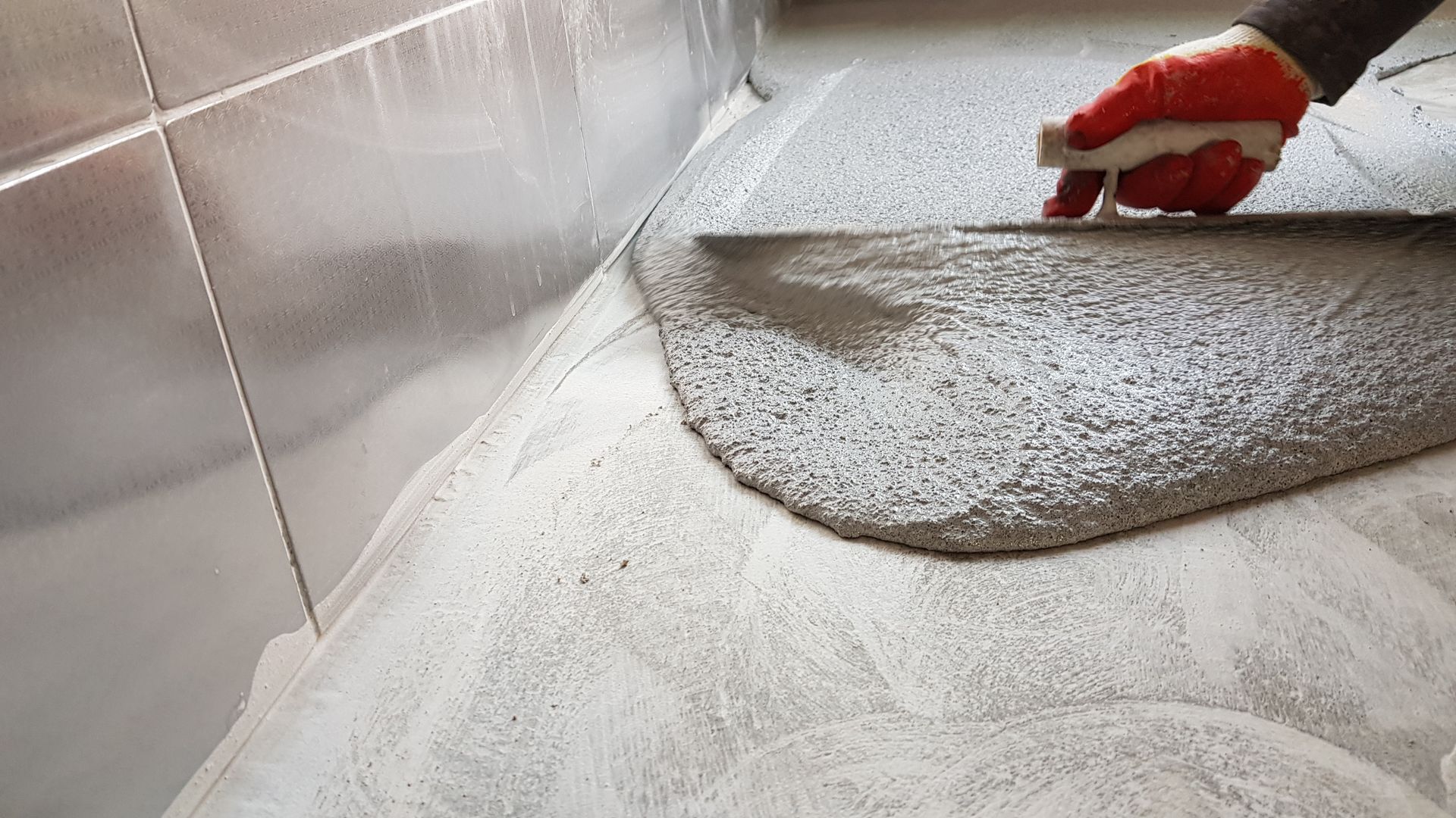 Aqua-Crete being hand-troweled on site